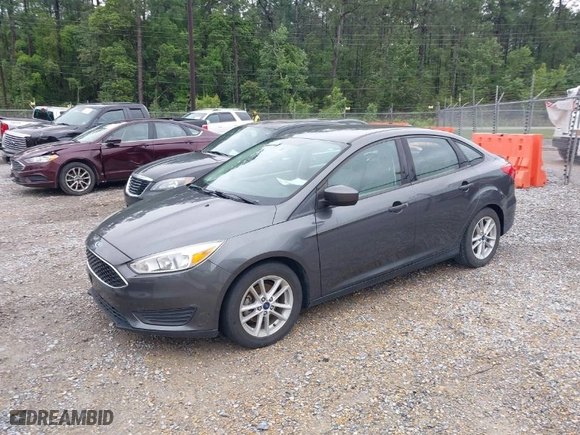 2018 Ford Focus SE with VIN 1FADP3FE9JL275194, listed as a IAAI auction lot 41979690 with 95,383 mi miles. Bid and sale history available at carsss.com. Image 2.