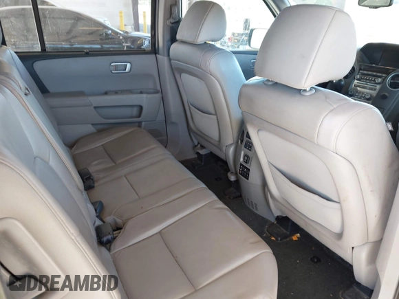 2013 Honda Pilot Touring with VIN 5FNYF4H95DB079782, listed as a IAAI auction lot 42737391 with 152,830 mi miles and . Bid and sale history available at DreamBid. Image 8.
