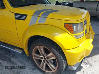 2011 Dodge Nitro z VIN 1D4PU6GX5BW512588, wystawiony jako IAAI lot #42471965 z przebiegiem 115 827 mil mil oraz . Historia ofert i sprzedaży dostępna na DreamBid. Obrazek 15.