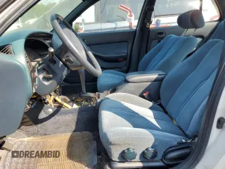 1992 Toyota Camry z VIN 4T1VK12E0NU015172, wystawiony jako Copart lot #58974095 z przebiegiem 210 163 mil mil oraz Szkoda całkowita • Salvage title. Historia ofert i sprzedaży dostępna na DreamBid. Obrazek 7.