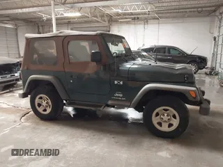 2003 Jeep Wrangler X z VIN 1J4FA39S43P339234, wystawiony jako IAAI lot #41329654 z przebiegiem 175 376 mil mil oraz . Historia ofert i sprzedaży dostępna na DreamBid. Obrazek 13.