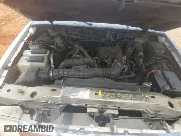 2003 Mazda B-Series Truck DS z VIN 4F4YR16V03TM05710, wystawiony jako Copart lot #54114605 z przebiegiem 187 857 mil mil oraz Szkoda całkowita • Salvage title. Historia ofert i sprzedaży dostępna na DreamBid. Obrazek 11.