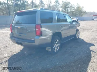 2019 Chevrolet Tahoe LT with VIN 1GNSKBKC0KR121493, listed as a IAAI auction lot 41656734 with 163,994 mi miles. Bid and sale history available at carsss.com. Image 4.