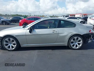 2005 BMW 6 Series 645Ci z VIN WBAEH73445B191324, wystawiony jako IAAI lot #42333115 z przebiegiem 77 317 mil mil oraz . Historia ofert i sprzedaży dostępna na DreamBid. Obrazek 6.