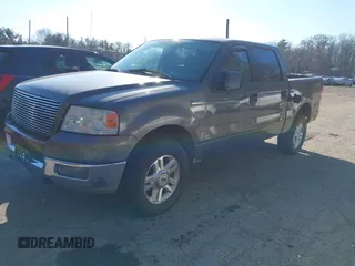 2004 Ford F-150 XLT with VIN 1FTRW14W84KC86653, listed as a IAAI auction lot 41376192 with 188,506 mi miles. Bid and sale history available at carsss.com. Image 2.