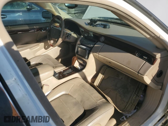 2004 Cadillac DeVille DTS z VIN 1G6KF57964U242365, wystawiony jako Copart lot #41645555 z przebiegiem Nie podano mil oraz Szkody całkowita. Historia ofert i sprzedaży dostępna na DreamBid. Obrazek 8.