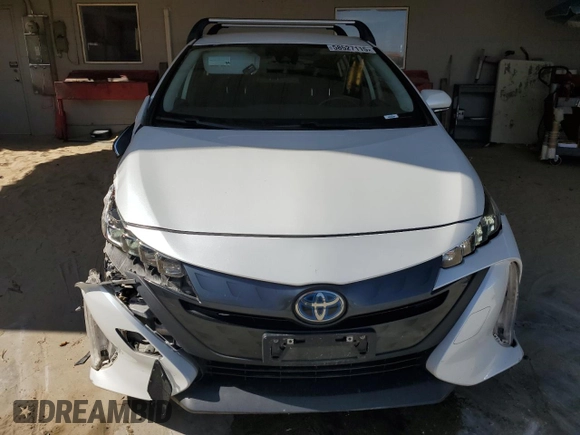 2021 Toyota Prius LE с VIN JTDKAMFP5M3186379, выставлен на аукционе Copart как лот 58527115 с пробегом 93 203 миль миль и Списание • Salvage title. История ставок и продаж доступна на DreamBid. Изображение 5.