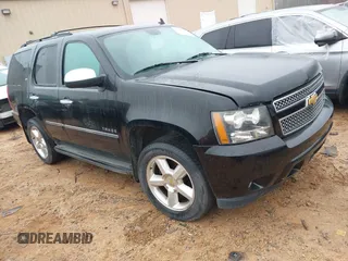 2013 Chevrolet Tahoe LTZ with VIN 1GNSKCE06DR282246, listed as a IAAI auction lot 41892831 with 181,389 mi miles and . Bid and sale history available at DreamBid. Image 1.