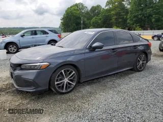 2024 Honda Civic Touring z VIN 2HGFE1F96RH324748, wystawiony jako Copart lot #58833725 z przebiegiem Nie podano mil oraz Szkoda całkowita • Salvage title. Historia ofert i sprzedaży dostępna na DreamBid. Obrazek 1.