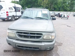 2000 Ford Explorer z VIN 1FMZU85P9YUB30553, wystawiony jako IAAI lot #42503777 z przebiegiem 209 062 mil mil oraz . Historia ofert i sprzedaży dostępna na DreamBid. Obrazek 6.