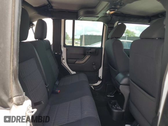 2016 Jeep Wrangler Unlimited Sport с VIN 1C4BJWDG9GL145305, выставлен на аукционе Copart как лот 59391845 с пробегом 101 425 миль миль и Списание • Salvage title. История ставок и продаж доступна на DreamBid. Изображение 11.