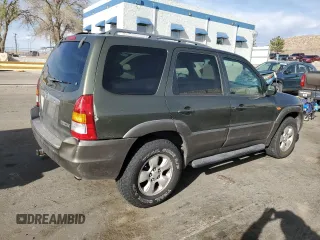 2002 Mazda Tribute LX with VIN 4F2YU09102KM66117, listed as a Copart auction lot 50425755 with 200,902 mi miles and Salvage Title. Bid and sale history available at carsss.com. Image 3.