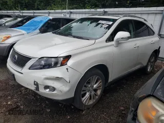 2012 Lexus RX 450h with VIN JTJBC1BA4C2432852, listed as a Copart auction lot 63113935 with 242,541 mi miles and Salvage title. Bid and sale history available at DreamBid. Image 1.