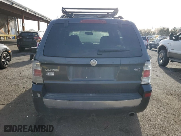 2009 Mercury Mariner z VIN 4M2CU91G49KJ04729, wystawiony jako Copart lot #49729105 z przebiegiem 235 117 mil mil oraz Szkoda całkowita • Salvage title. Historia ofert i sprzedaży dostępna na DreamBid. Obrazek 6.