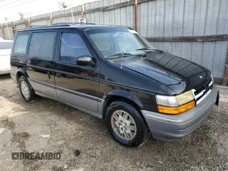 1991 Dodge Caravan z VIN 2B4GK55R6MR136865, wystawiony jako Copart lot #83209824 z przebiegiem 44 931 mil mil oraz Tytuł czysty. Historia ofert i sprzedaży dostępna na DreamBid. Obrazek 4.