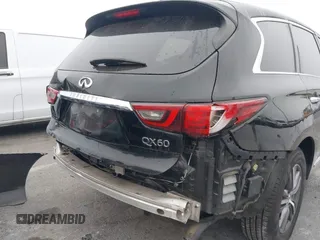 2019 Infiniti QX60 LUXE with VIN 5N1DL0MN7KC500202, listed as a IAAI auction lot 41229623 with 103,626 mi miles. Bid and sale history available at carsss.com. Image 6.