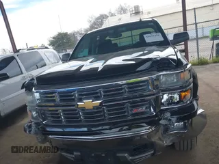 2014 Chevrolet Silverado 1500 LT with VIN 1GCVKREC5EZ325771, listed as a IAAI auction lot 41691858 with 123,475 mi miles and . Bid and sale history available at DreamBid. Image 13.