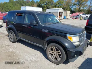 2007 Dodge Nitro SLT z VIN 1D8GT58K37W566221, wystawiony jako IAAI lot #40687618 z przebiegiem 286 701 mil mil oraz . Historia ofert i sprzedaży dostępna na DreamBid. Obrazek 1.