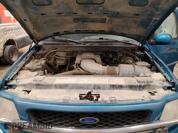 1997 Ford F-150 XL with VIN 1FTDX186XVKC03985, listed as a Copart auction lot 52808035 with 274,590 mi miles and Clean title. Bid and sale history available at DreamBid. Image 11.
