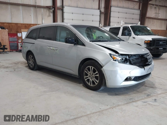 2012 Honda Odyssey EX z VIN 5FNRL5H47CB045705, wystawiony jako IAAI lot #42384430 z przebiegiem 157 598 mil mil oraz . Historia ofert i sprzedaży dostępna na DreamBid. Obrazek 1.