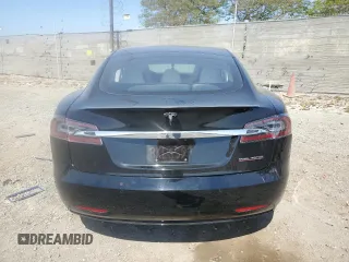 2019 Tesla Model S 100D with VIN 5YJSA1E42KF331240, listed as a Copart auction lot 54713975 with 43,940 mi miles and Salvage title. Bid and sale history available at DreamBid. Image 6.
