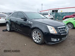 2008 Cadillac CTS RWD w/1SB with VIN 1G6DR57V580176739, listed as a IAAI auction lot 41847461 with 136,482 mi miles. Bid and sale history available at carsss.com. Image 1.