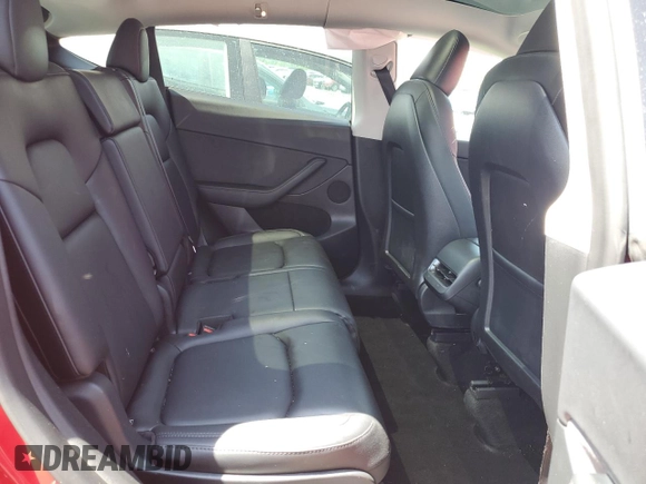 2023 Tesla Model Y Long Range z VIN 7SAYGAEE8PF701618, wystawiony jako Copart lot #57573875 z przebiegiem 39 463 mil mil oraz Szkoda całkowita • Salvage title. Historia ofert i sprzedaży dostępna na DreamBid. Obrazek 10.