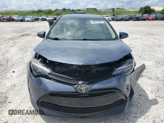 2019 Toyota Corolla L z VIN 5YFBURHE3KP940044, wystawiony jako Copart lot #58835385 z przebiegiem 54 375 mil mil oraz Szkoda całkowita • Salvage title. Historia ofert i sprzedaży dostępna na DreamBid. Obrazek 5.