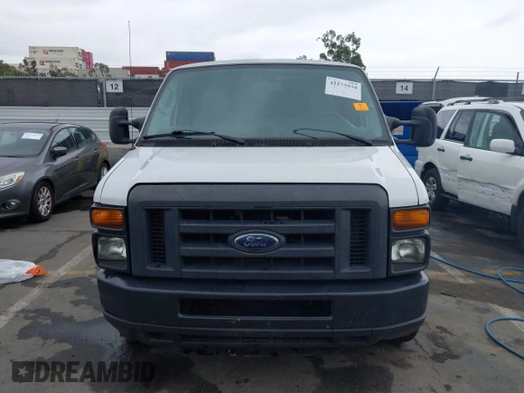 2014 Ford Econoline Cargo Commercial with VIN 1FTNE1EWXEDA18404, listed as a IAAI auction lot 42173934 with 188,301 mi miles and . Bid and sale history available at DreamBid. Image 12.