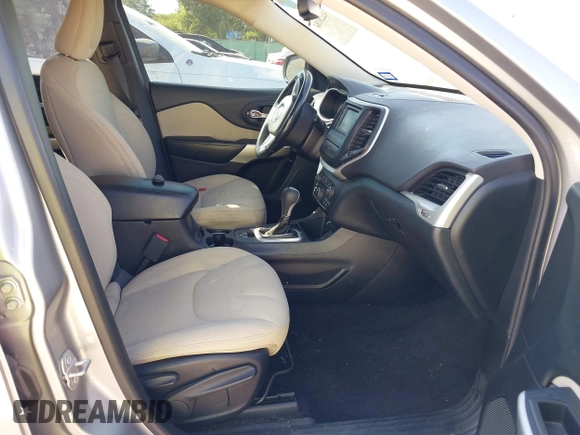 2017 Jeep Cherokee Latitude with VIN 1C4PJLCBXHW573751, listed as a IAAI auction lot 42220184 with 127,362 mi miles and . Bid and sale history available at DreamBid. Image 5.