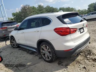 2017 BMW X1 xDrive28i z VIN WBXHT3C35H5F86099, wystawiony jako Copart lot #60196275 z przebiegiem 61 117 mil mil oraz Szkoda całkowita • Salvage title. Historia ofert i sprzedaży dostępna na DreamBid. Obrazek 2.