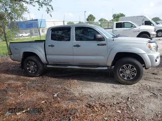 2005 Toyota Tacoma PreRunner z VIN 3TMJU62N15M003398, wystawiony jako IAAI lot #42490056 z przebiegiem 246 125 mil mil oraz . Historia ofert i sprzedaży dostępna na DreamBid. Obrazek 13.