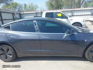 2018 Tesla Model 3 Long Range Battery with VIN 5YJ3E1EA4JF157782, listed as a IAAI auction lot 41774169 with 123,239 mi miles. Bid and sale history available at carsss.com. Image 14.