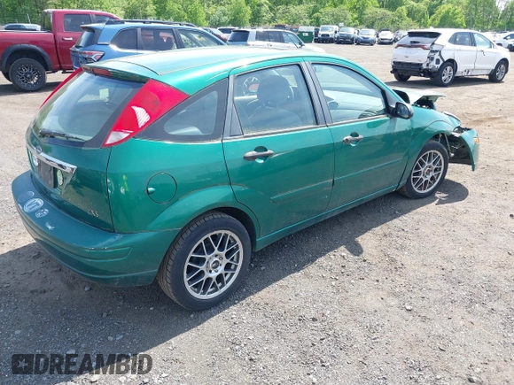 2002 Ford Focus ZX5 z VIN 3FAFP373X2R130965, wystawiony jako IAAI lot #42216638 z przebiegiem 59 236 mil mil oraz . Historia ofert i sprzedaży dostępna na DreamBid. Obrazek 4.
