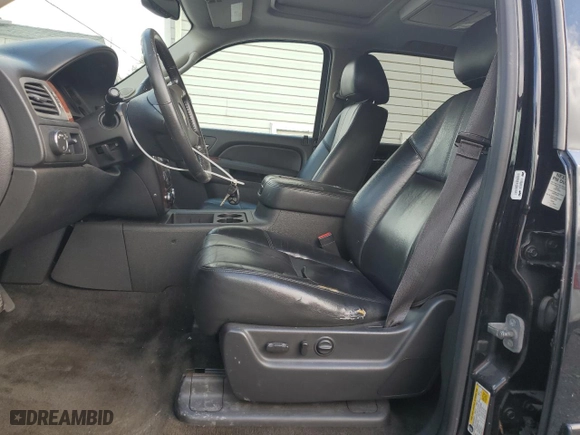 2013 Chevrolet Suburban LT with VIN 1GNSCJE02DR359695, listed as a Copart auction lot 49069875 with 341,508 mi miles and Clean Title. Bid and sale history available at carsss.com. Image 7.