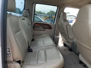 2004 Ford Super Duty F-250 XL with VIN 1FTNW21P14EA23582, listed as a Copart auction lot 62658954 with 205,382 mi miles and Salvage Title. Bid and sale history available at carsss.com. Image 10.