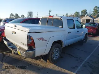 2010 Toyota Tacoma PreRunner with VIN 3TMJU4GN4AM100621, listed as a IAAI auction lot 41786994 with 222,327 mi miles and . Bid and sale history available at DreamBid. Image 4.