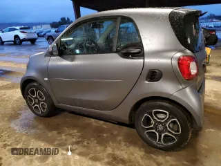 2019 Smart fortwo Pure z VIN WMEFJ9BA2KK396037, wystawiony jako Copart lot #83991904 z przebiegiem 32 137 mil mil oraz Szkody całkowita. Historia ofert i sprzedaży dostępna na DreamBid. Obrazek 2.