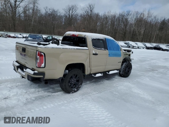 2021 GMC Canyon 4WD AT4 w/Leather with VIN 1GTG6FEN8M1279301, listed as a Copart auction lot 89373145 with 34,035 mi miles and Salvage Title. Bid and sale history available at carsss.com. Image 3.
