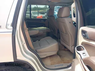 2015 Chevrolet Tahoe LT z VIN 1GNSCBKC7FR140125, wystawiony jako IAAI lot #42279760 z przebiegiem 201 335 mil mil oraz . Historia ofert i sprzedaży dostępna na DreamBid. Obrazek 8.