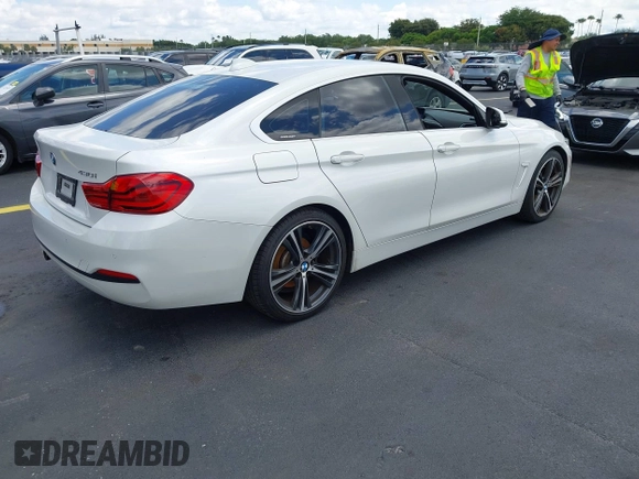 2018 BMW 4 Series 430i with VIN WBA4J1C5XJBG78451, listed as a IAAI auction lot 42256036 with 103,289 mi miles and . Bid and sale history available at DreamBid. Image 4.