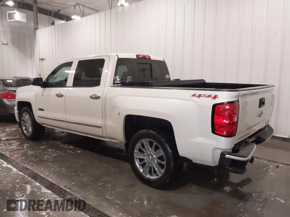 2014 Chevrolet Silverado 1500 High Country with VIN 3GCUKTEC4EG527722, listed as a IAAI auction lot 41978841 with 104,492 mi miles and . Bid and sale history available at DreamBid. Image 3.