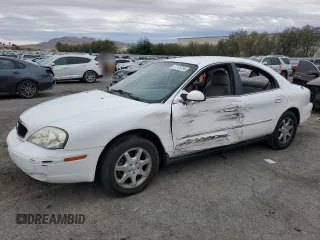 2001 Mercury Sable z VIN 1MEFM53U31A629921, wystawiony jako Copart lot #77173754 z przebiegiem 122 769 mil mil oraz Szkody całkowita. Historia ofert i sprzedaży dostępna na DreamBid. Obrazek 1.