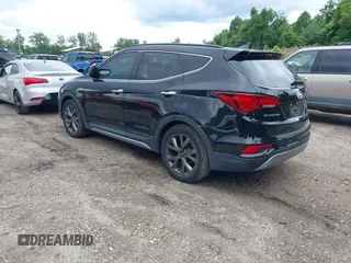 2017 Hyundai Santa Fe Ultimate z VIN 5XYZW4LA9HG416653, wystawiony jako IAAI lot #42350652 z przebiegiem 122 000 mil mil oraz . Historia ofert i sprzedaży dostępna na DreamBid. Obrazek 3.