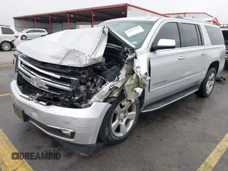 2015 Chevrolet Suburban LTZ with VIN 1GNSCKKC1FR507665, listed as a IAAI auction lot 41517753 with 162,604 mi miles. Bid and sale history available at carsss.com. Image 2.