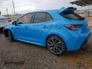 2019 Toyota Corolla Hatchback SE with VIN JTNK4RBE8K3055593, listed as a Copart auction lot 64194594 with 157,171 mi miles and Salvage Title. Bid and sale history available at carsss.com. Image 2.