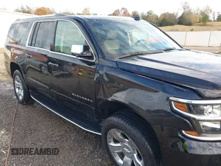 2020 Chevrolet Suburban Premier with VIN 1GNSCJKC0LR121728, listed as a IAAI auction lot 41105003 with 43,820 mi miles and . Bid and sale history available at DreamBid. Image 6.