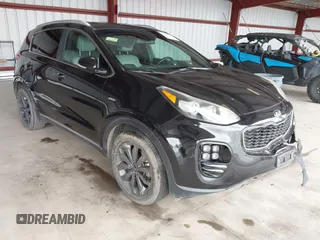 2018 Kia Sportage EX z VIN KNDPNCAC6J7410501, wystawiony jako IAAI lot #42058155 z przebiegiem 157 307 mil mil oraz . Historia ofert i sprzedaży dostępna na DreamBid. Obrazek 1.