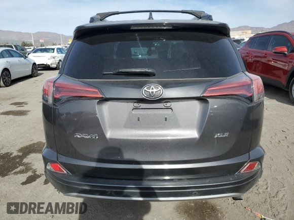 2017 Toyota RAV4 XLE with VIN 2T3WFREV9HW344967, listed as a Copart auction lot 41572985 with 113,944 mi miles and Salvage Title. Bid and sale history available at DreamBid. Image 6.