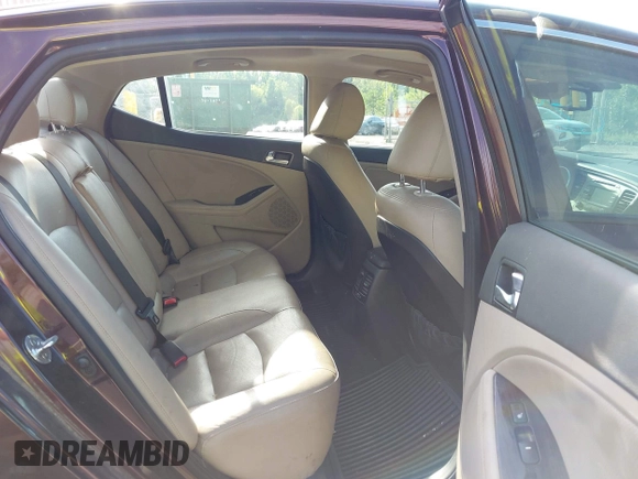 2015 Kia Optima EX with VIN 5XXGN4A75FG351223, listed as a IAAI auction lot 42732567 with 124,400 mi miles and . Bid and sale history available at DreamBid. Image 8.